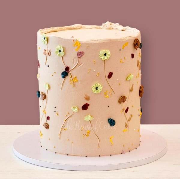 elegant beige cake with buttercream flowers