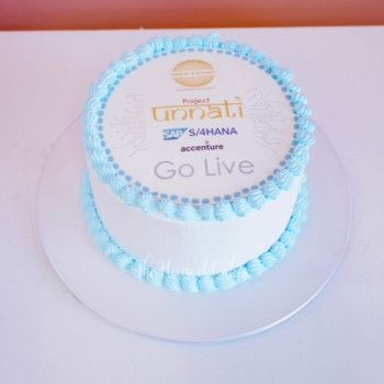 Round cake with company logo